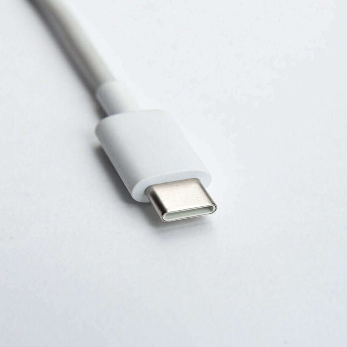 Close-up of a white USB-C cable on a white background.