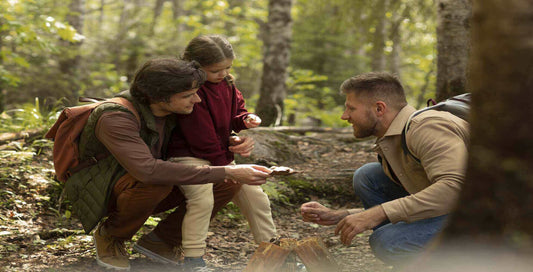 Family exploring nature together in a forest, bonding over outdoor activities, creating unforgettable memories.