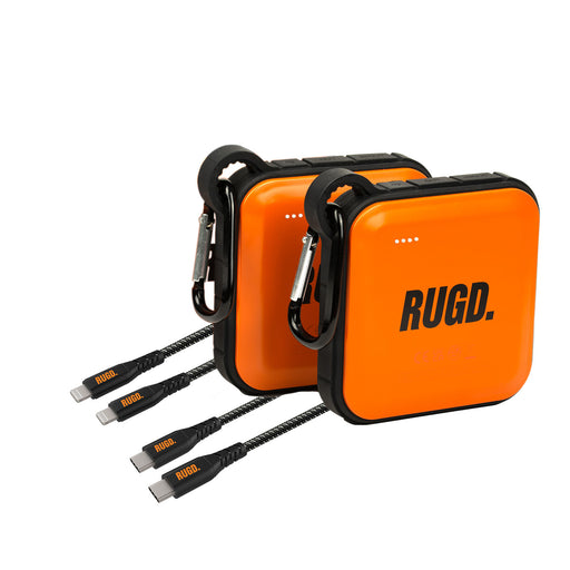 Two RUGD Power Bricks with bright camping lights and Rhino Power Cables for dual charging. Perfect for outdoor adventures and eco-friendly packaging.