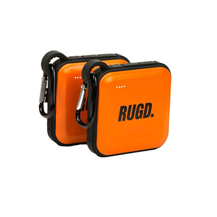 RUGD Power Brick I (2 Pack) in vibrant orange, portable camping power bank with carabiner clip for outdoor adventures.